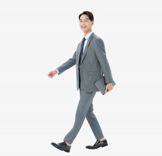 青年商务男性拿着笔记本电脑